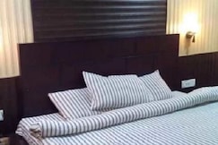 Aum Hotel, Khatima