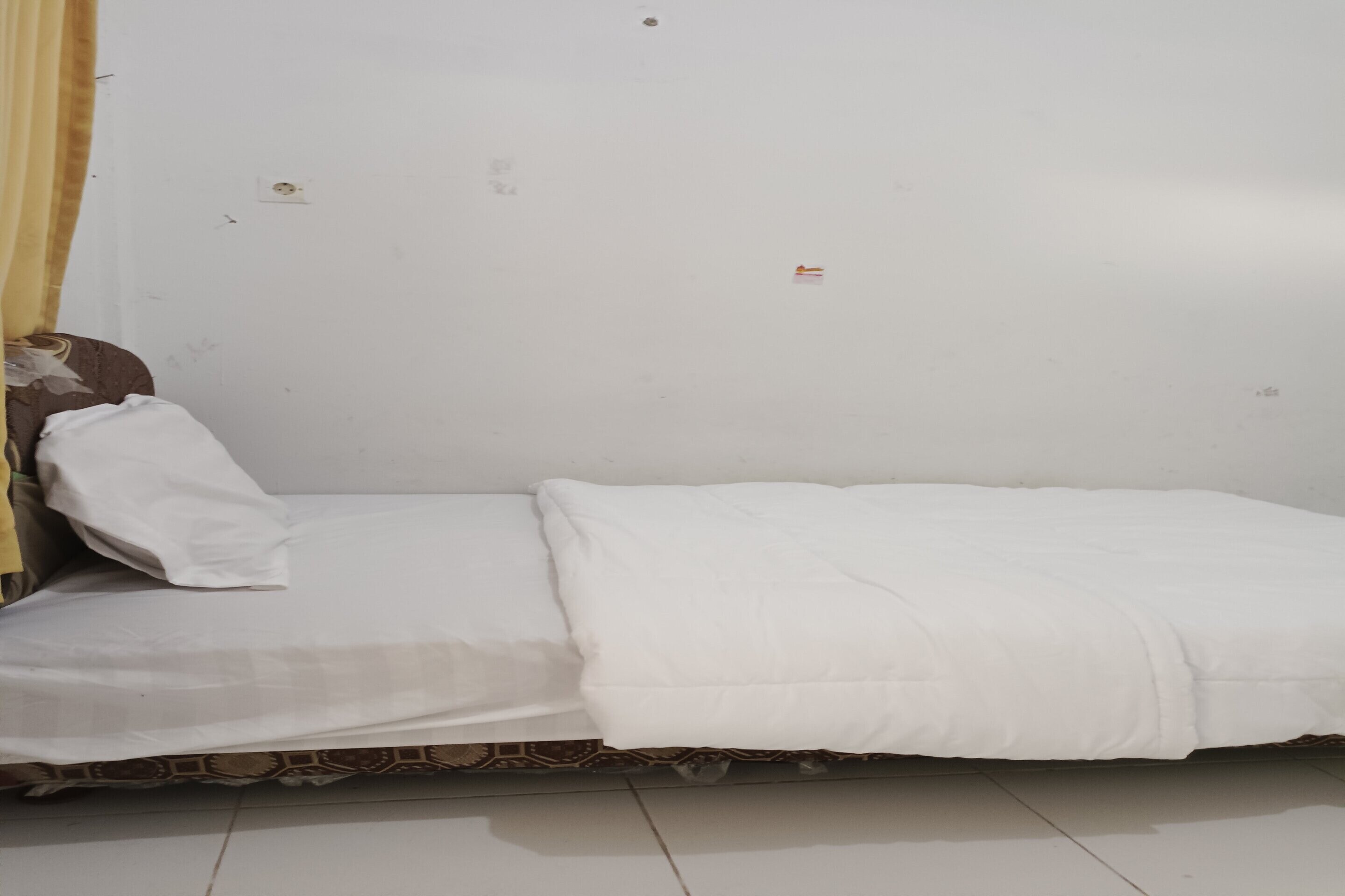 SPOT ON 93375 Elang Homestay - Tap to explore photos
