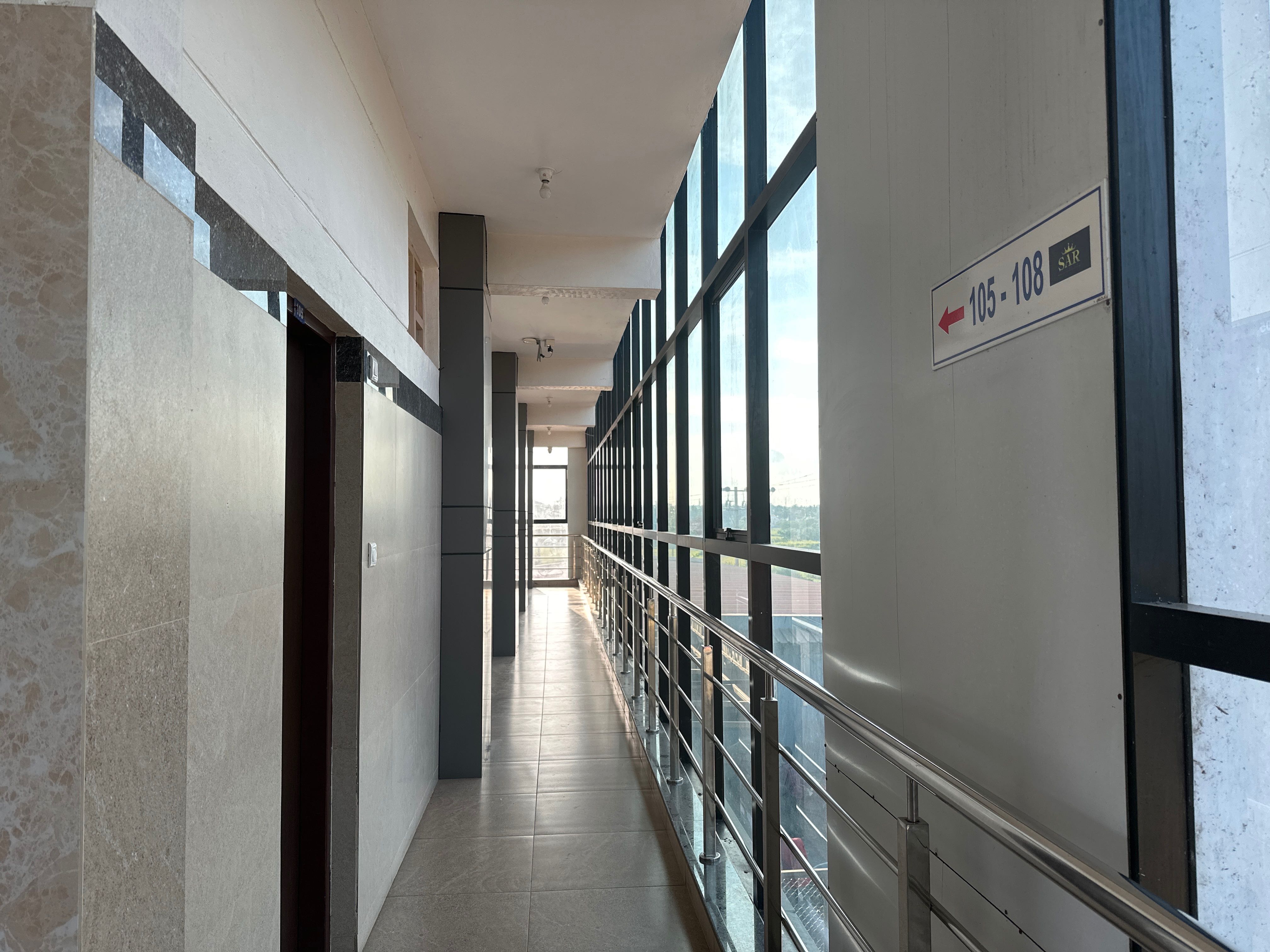 Super Hotel O SAR Residency - Tap to explore photos