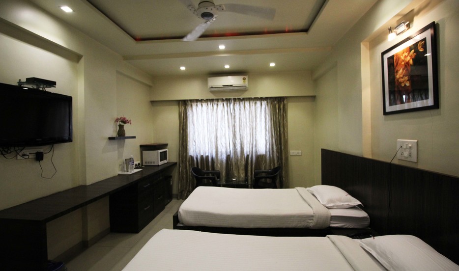 Suresh Inn Business Hotel - Tap to explore photos