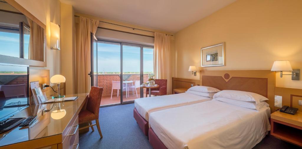 Best Western Hotel I Triangoli - Tap to explore photos
