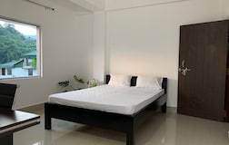 Cosy Bedroom with Balcony, Common Living Room, Shared Bathroom and Kitchenette