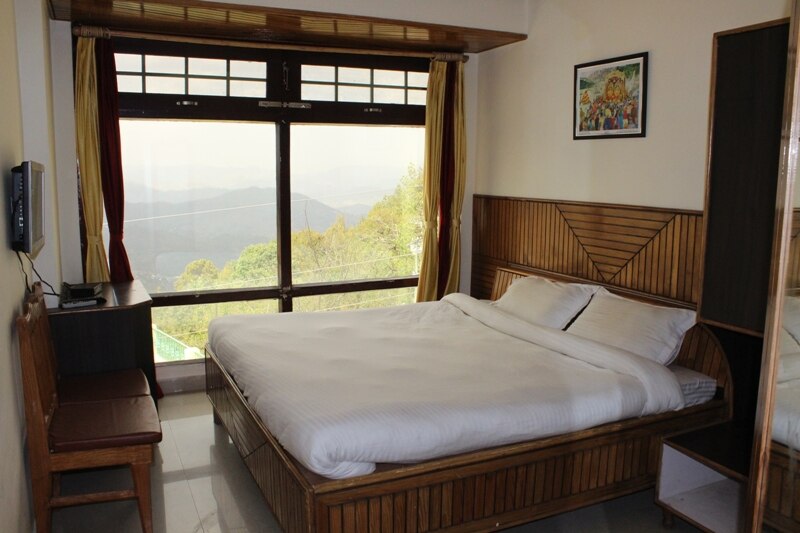 Hotel Sheetalam - Tap to explore photos