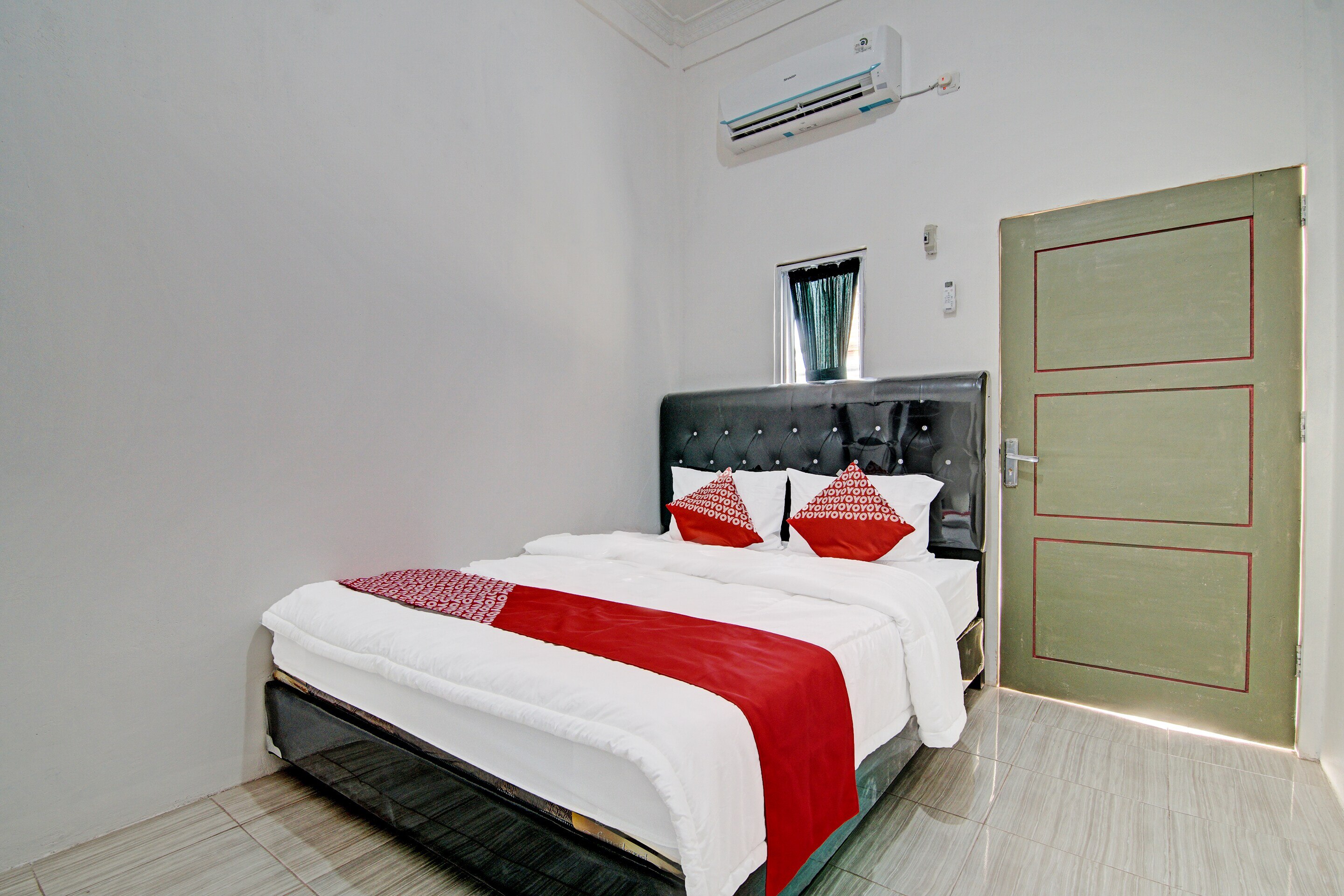 Hotel O Elif Homestay Syariah - Tap to explore photos