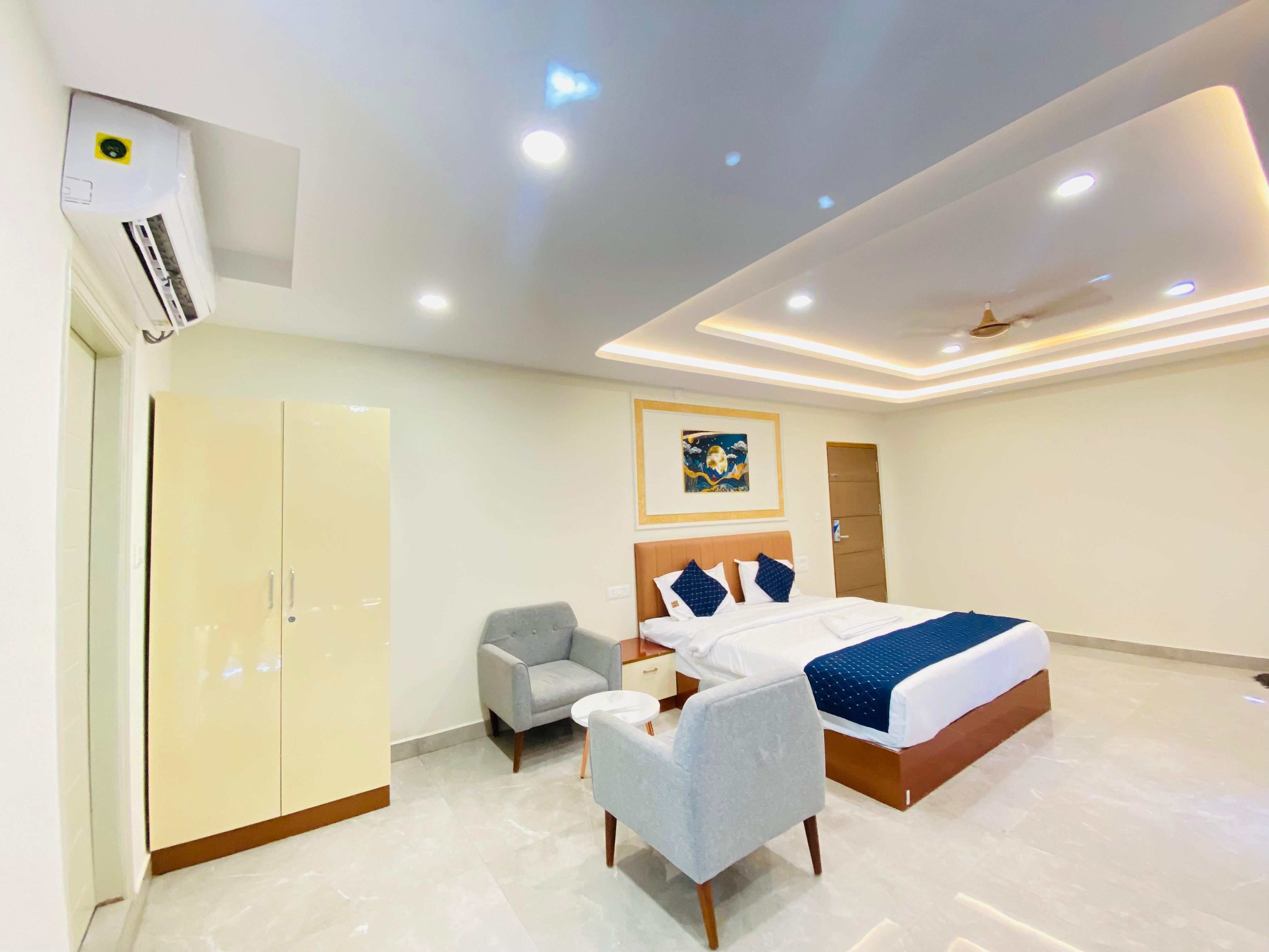 FIODA ROYAL ROOMS KR PURAM - Tap to explore photos