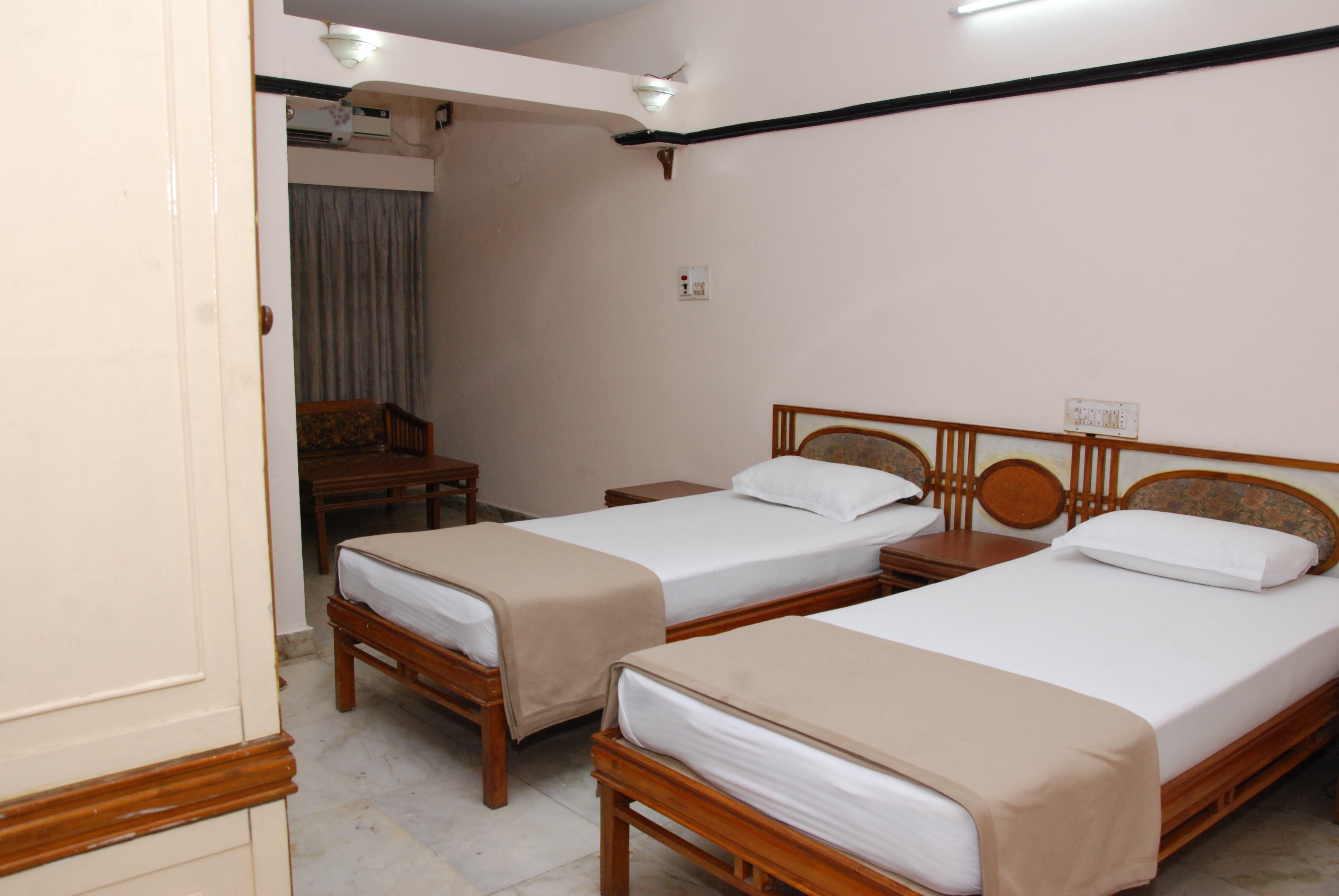 Amogha International Hotel - Tap to explore photos