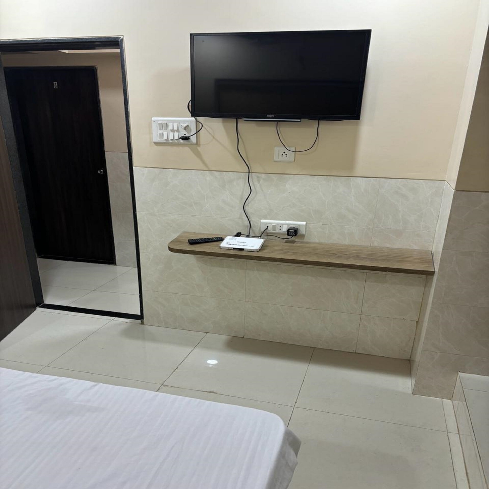 Milan Guest House Mumbai - Tap to explore photos