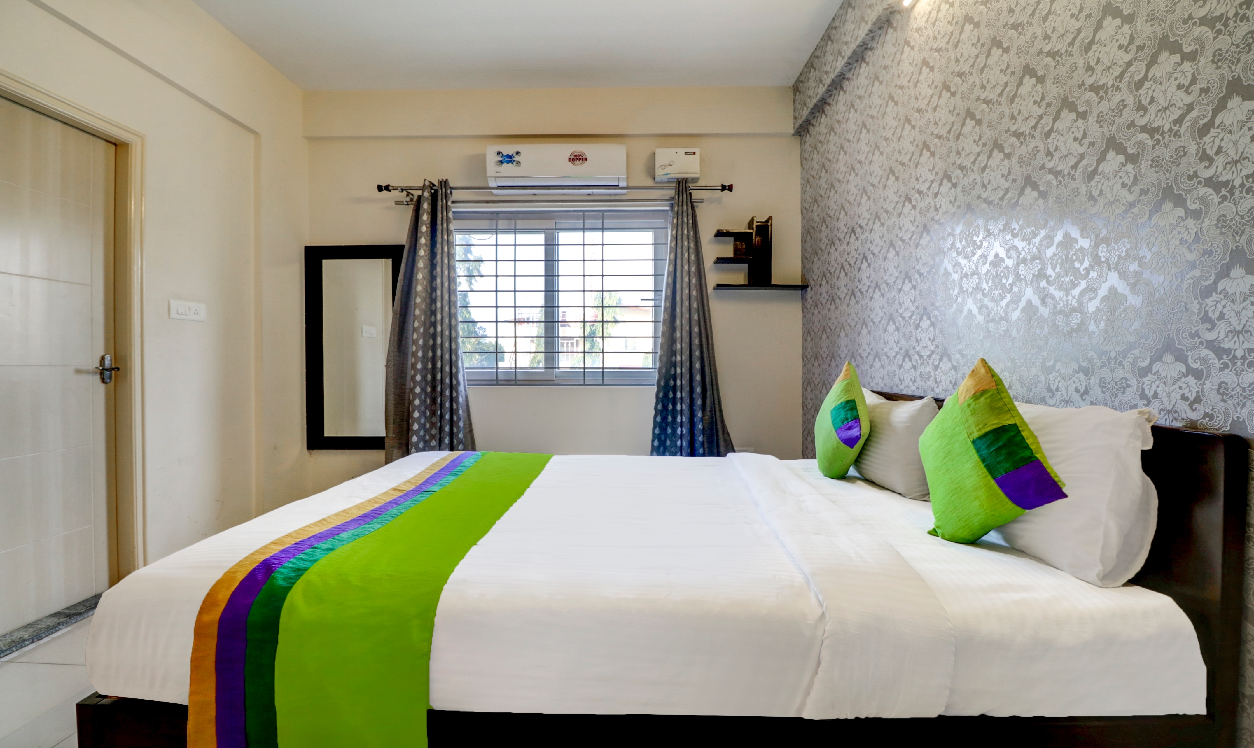 Treebo 12 Degrees West, 750 M From Embassy Golf Links Business Park - Tap to explore photos