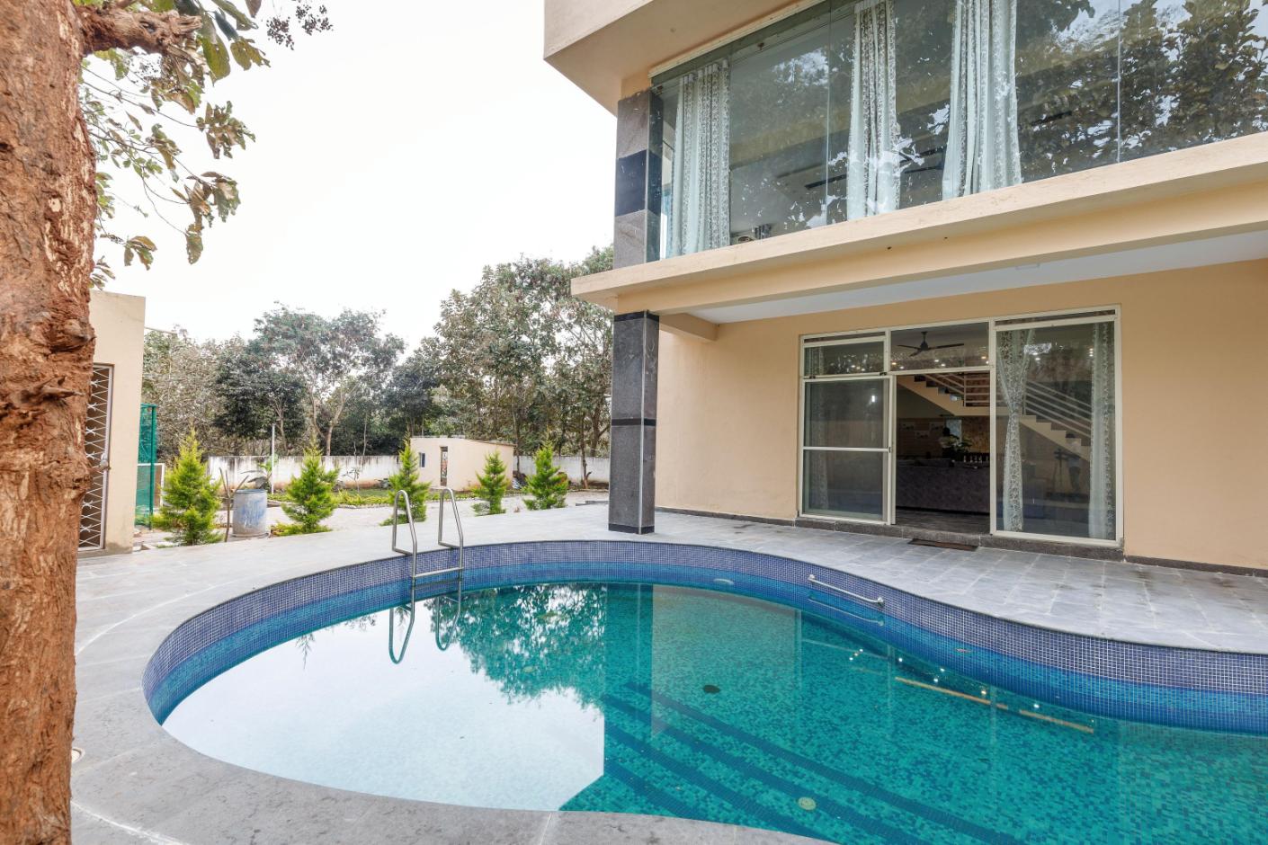 Villa Exotica by StayJade|5BHK|Pool|AC|Projector - Tap to explore photos