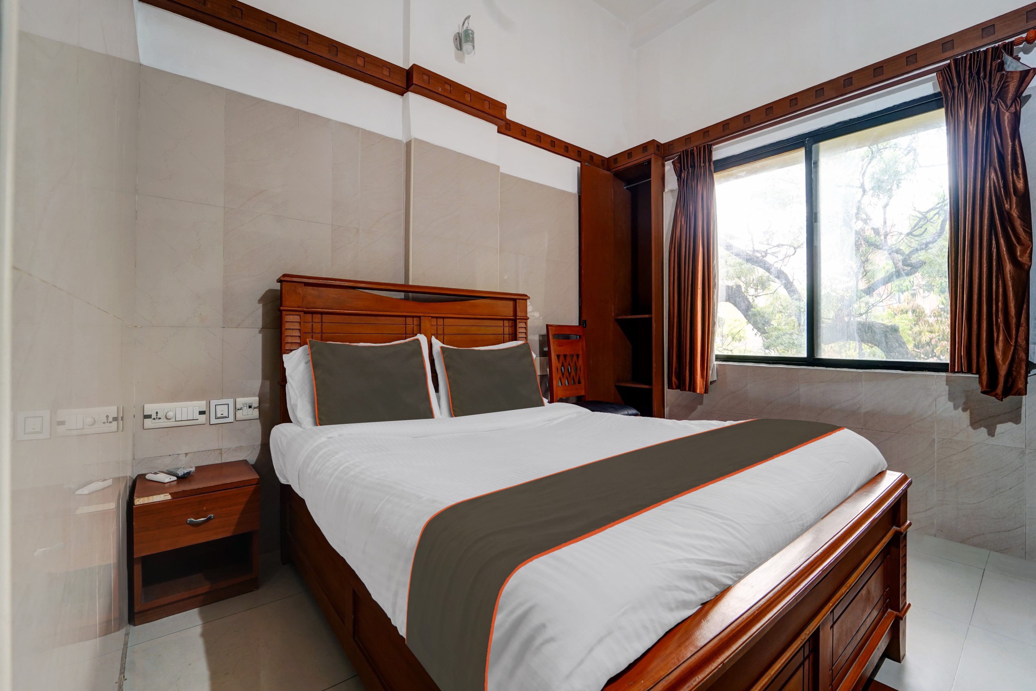 Collection O Skry Hotels Gandhipuram - Tap to explore photos