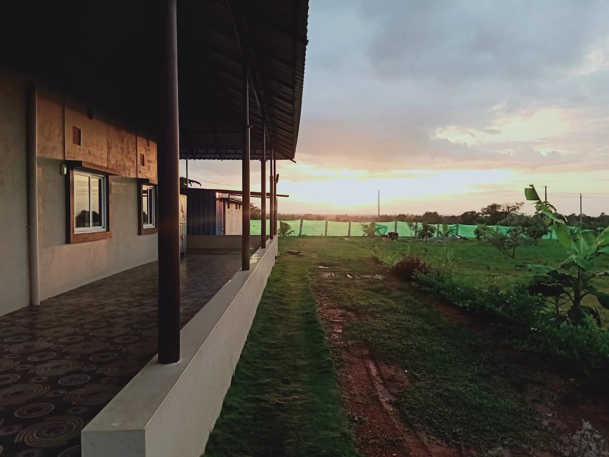 Amrutha Farms with Private Pool and Rain dance - Tap to explore photos