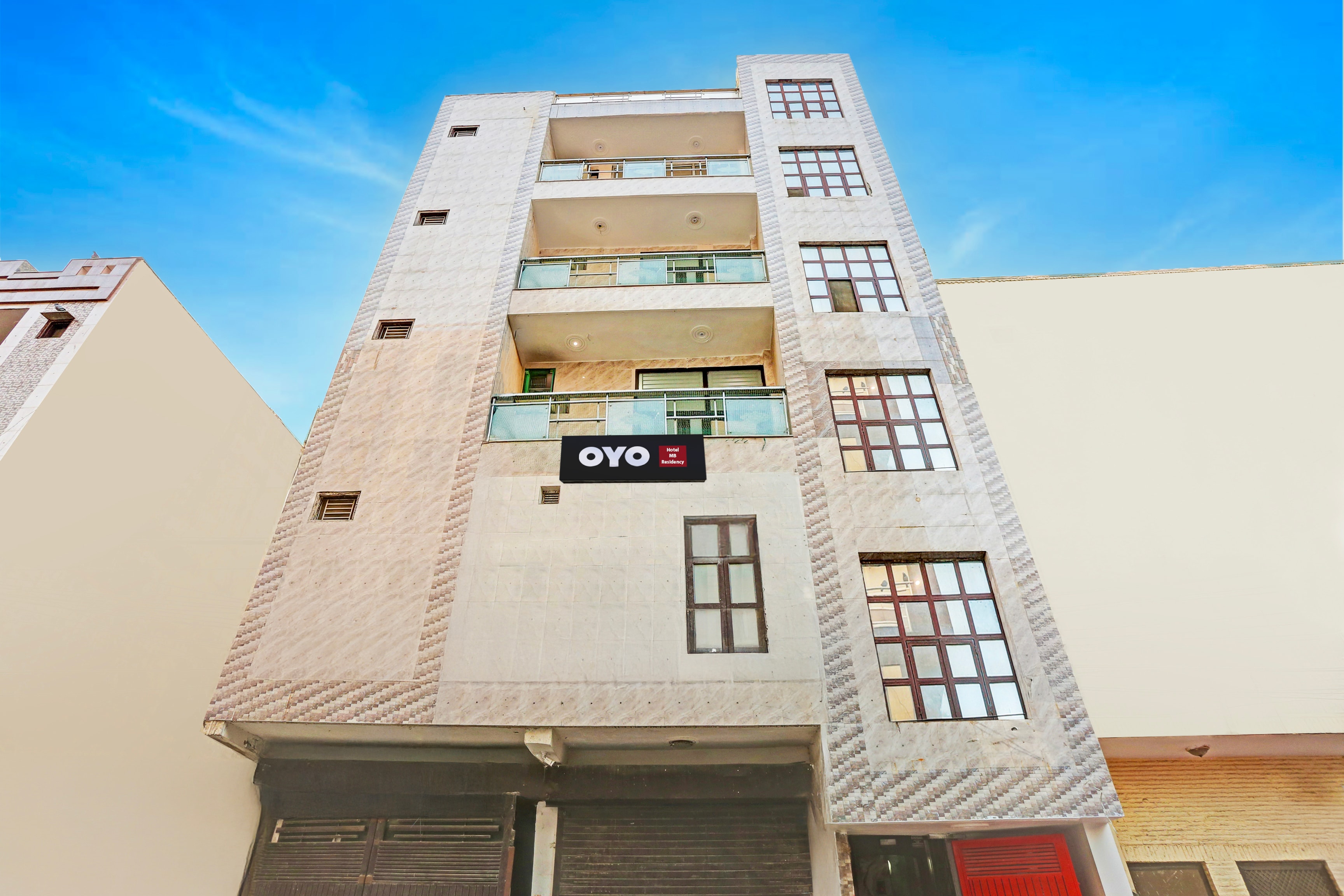 Hotel O M B residency - Tap to explore photos