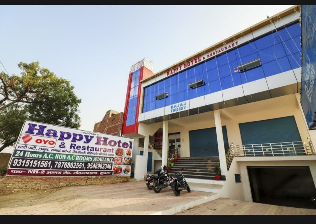 Happy Hotel and Restaurant  by WB Inn - Tap to explore photos