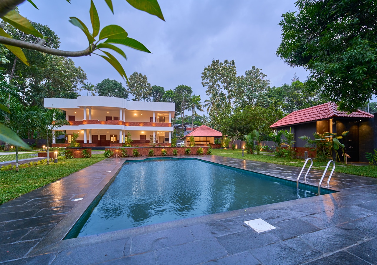 VOYE HOMES Signature Pool Resort Varkala - Tap to explore photos