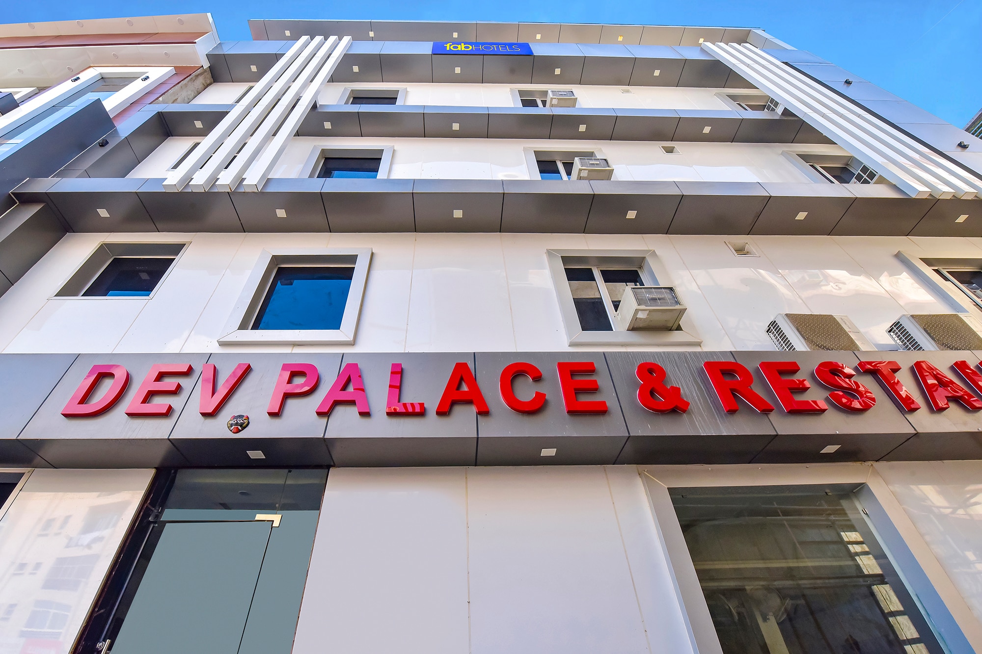 FabHotel Dev Palace - Tap to explore photos