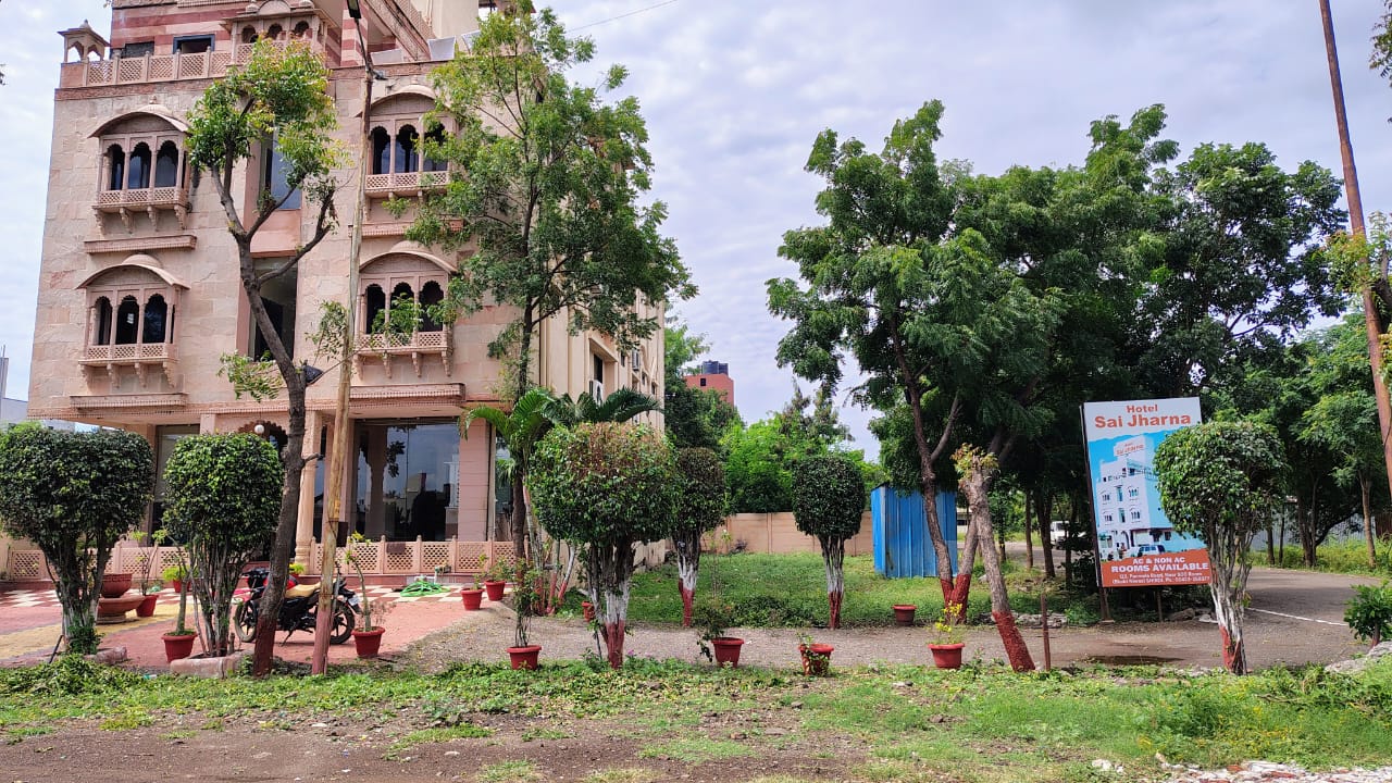 Hotel Sai Jharna - Tap to explore photos