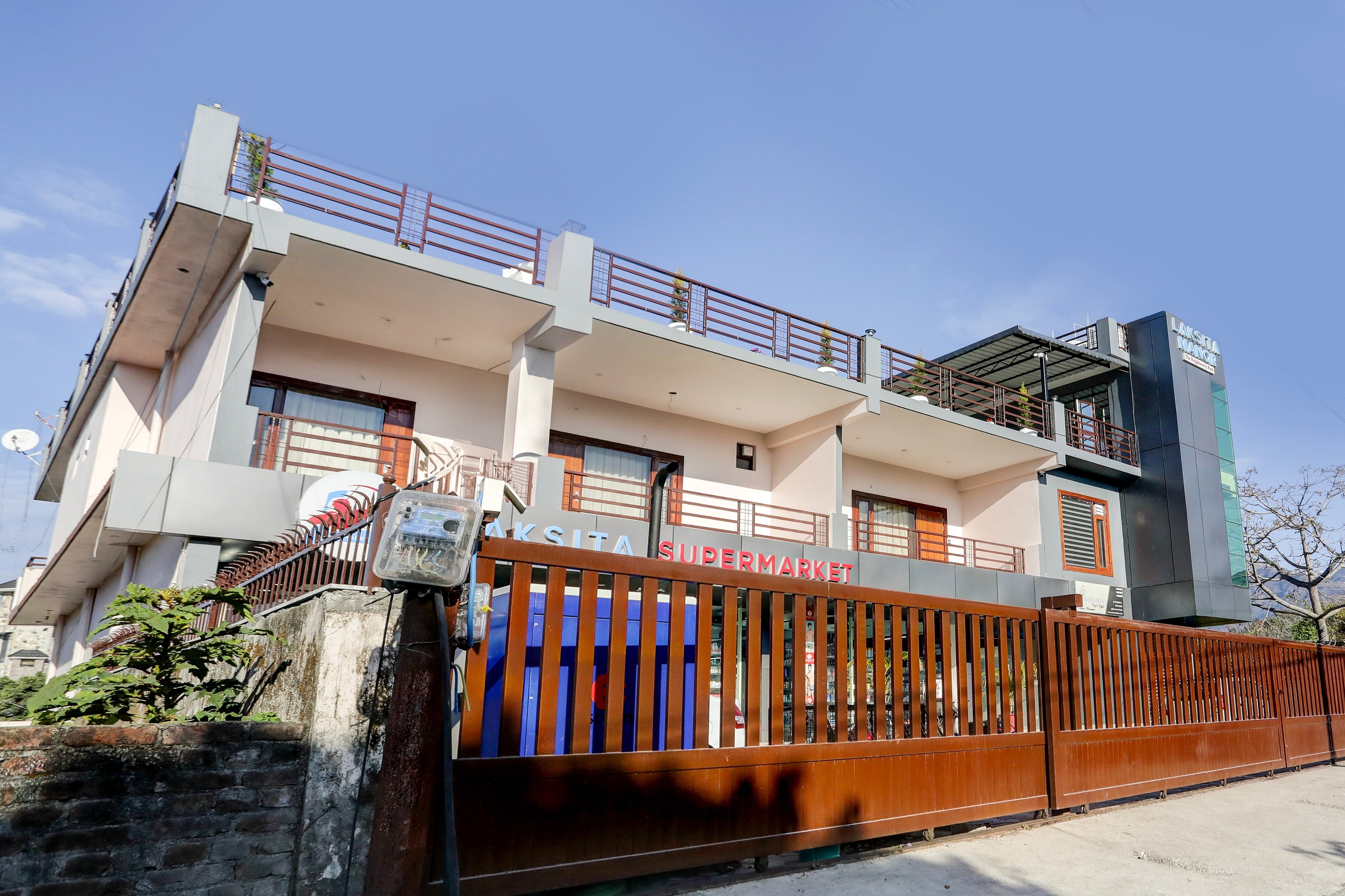 Hotel O Laksita Manor Home Stay - Tap to explore photos