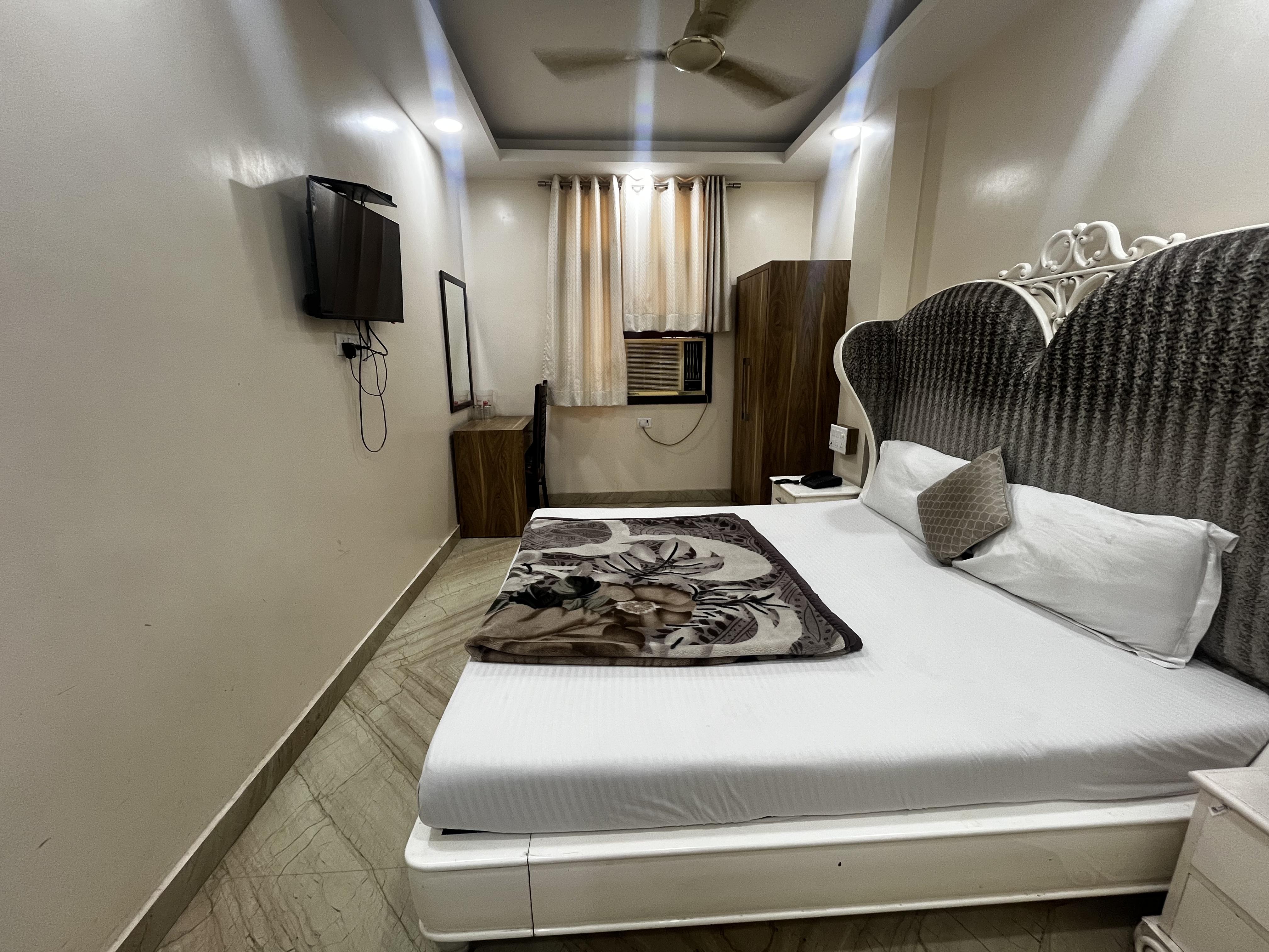 Hotel Poonam International - Tap to explore photos