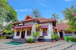 Hotel O Poptavern Heritage, Kovalam and Poovar