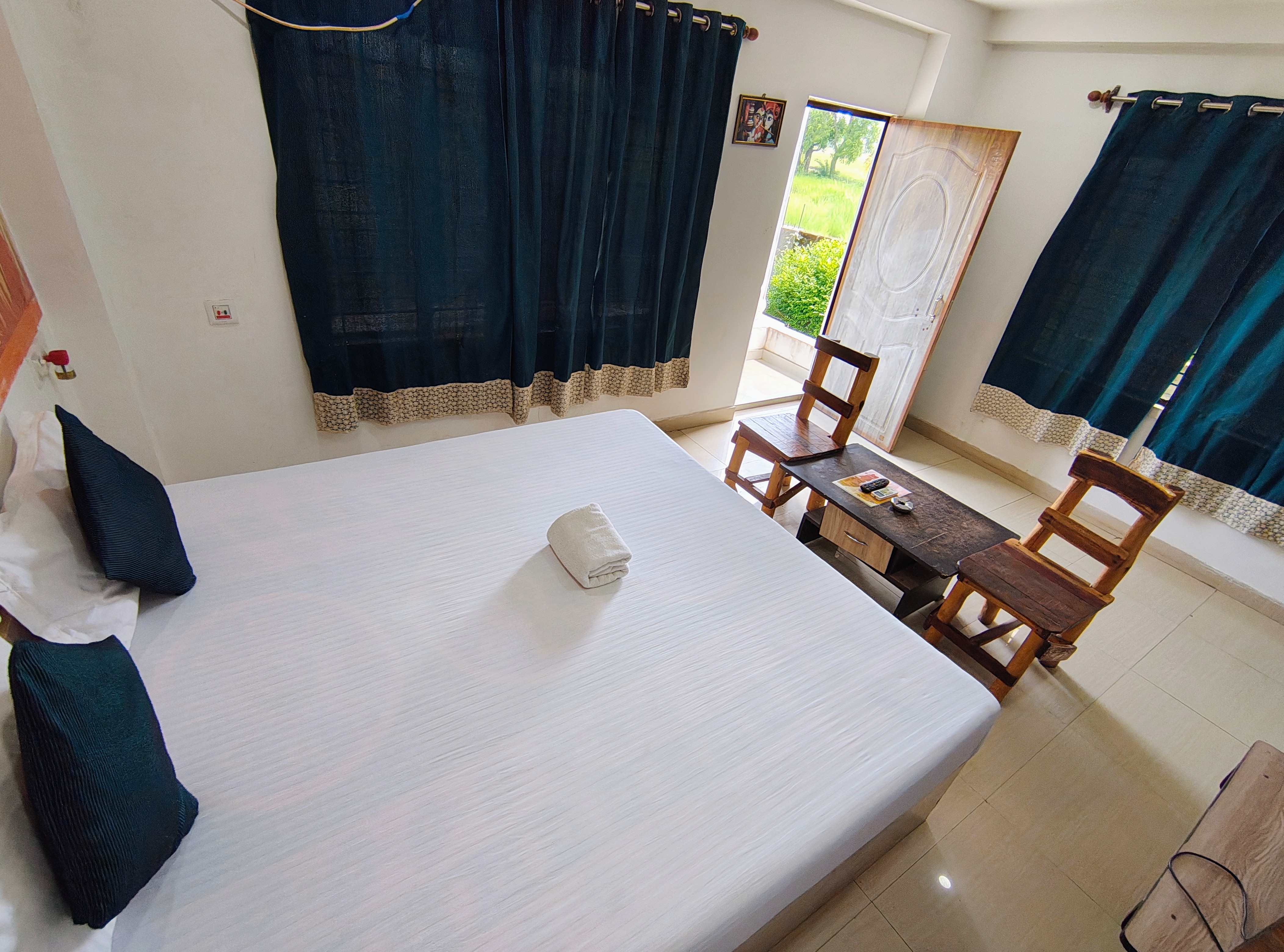 STAYMAKER Gharana Hotel and Resort - Tap to explore photos