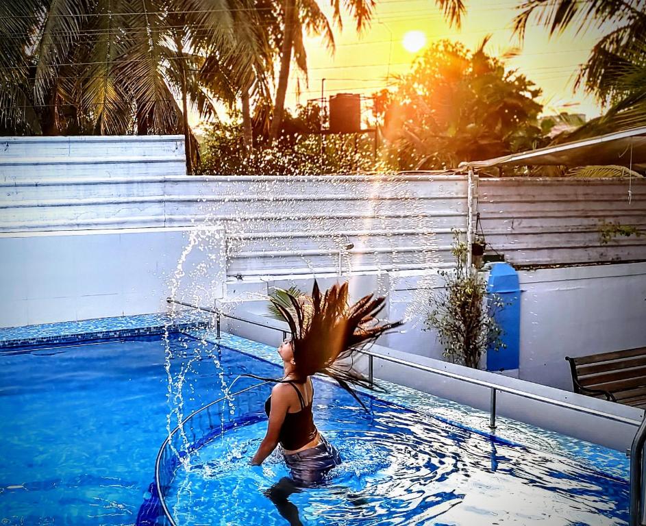 Mitra Hostel by the Pool - Tap to explore photos