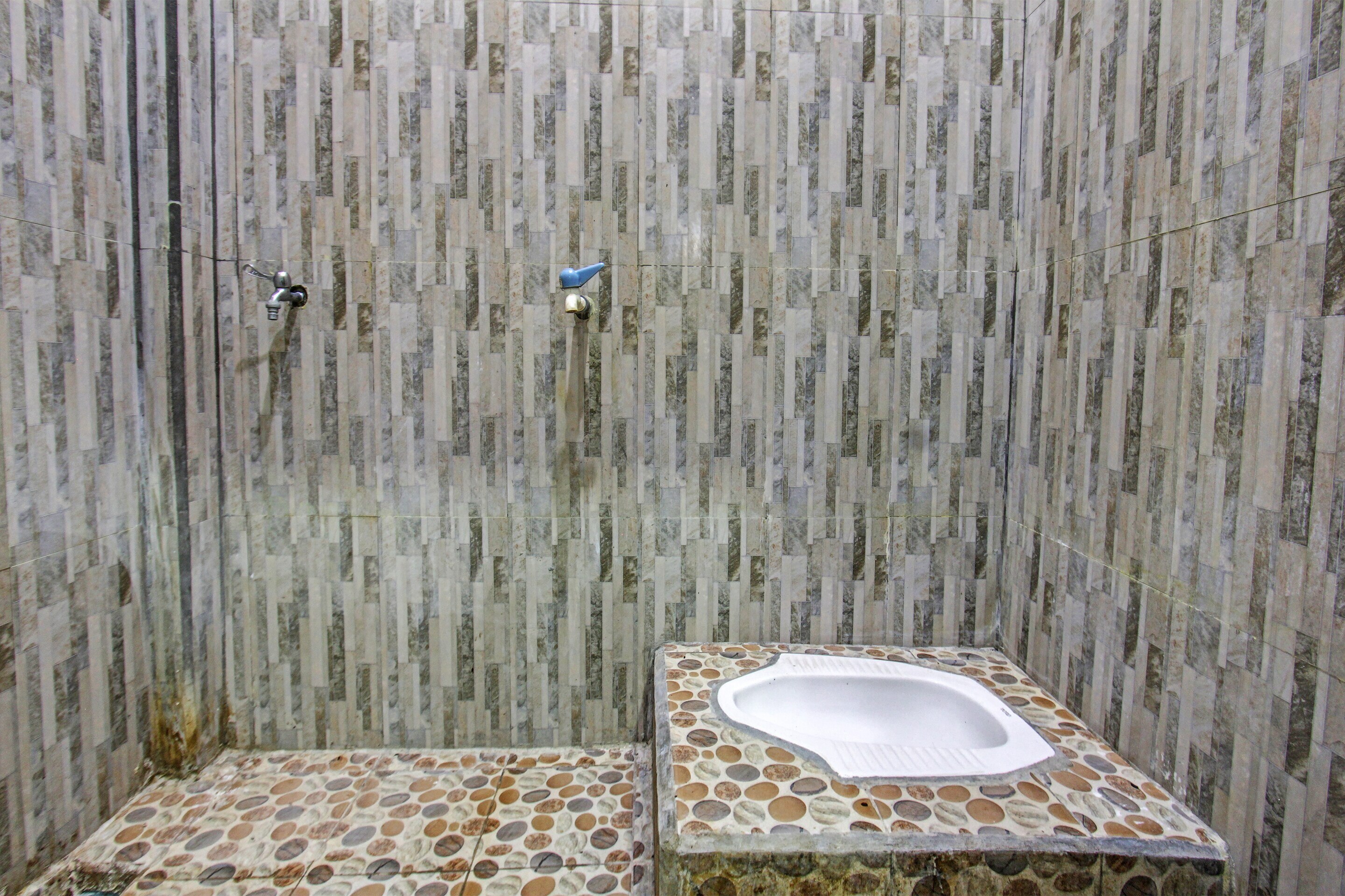 SPOT ON 91771 Homestay Bang Haji - Tap to explore photos
