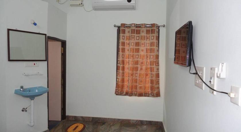 Auro GP Guest House - Tap to explore photos
