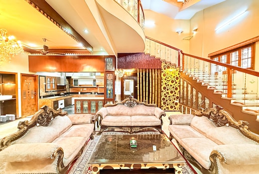 Wooden Whispers - A Luxe Traditional Spacez Villa with Private Theatre & Terrace