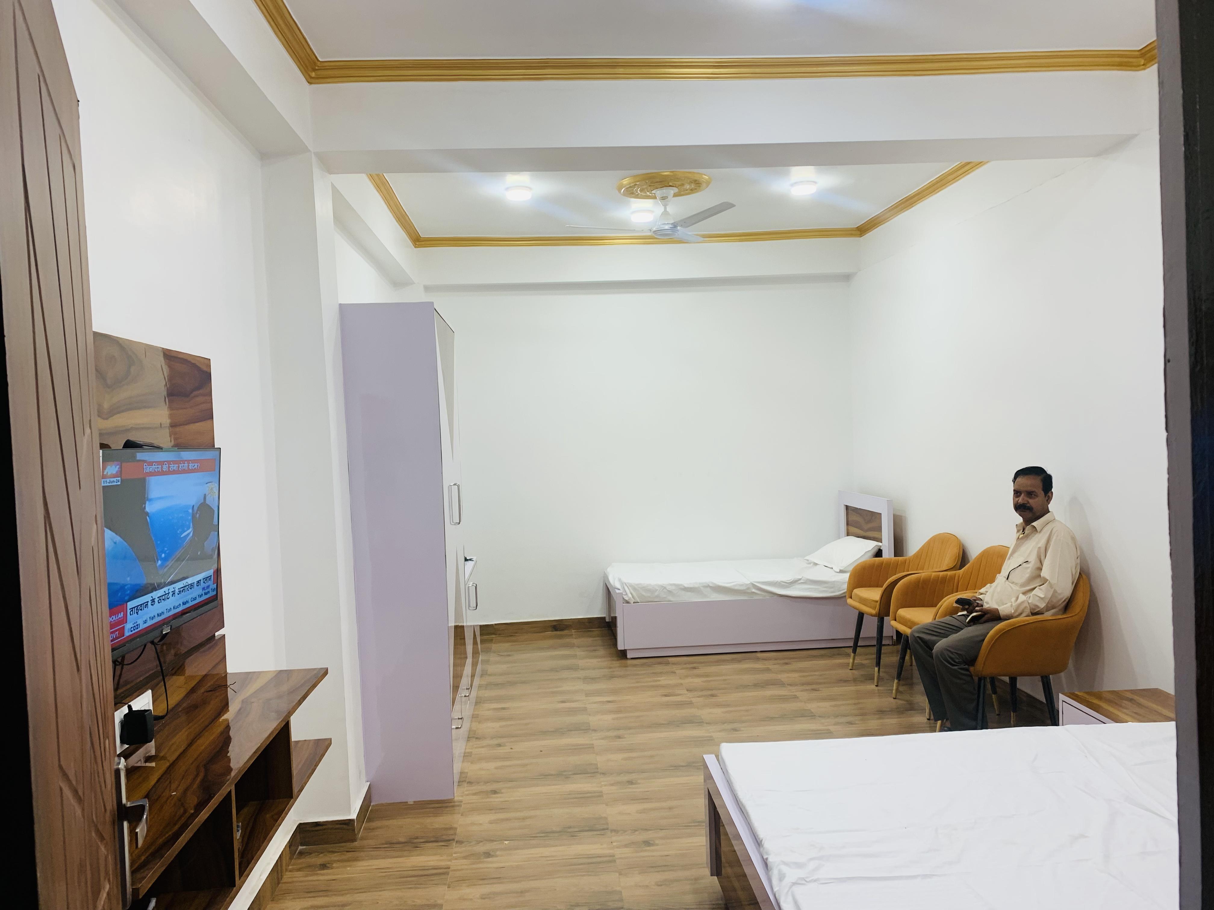 Mohan guest house - Tap to explore photos