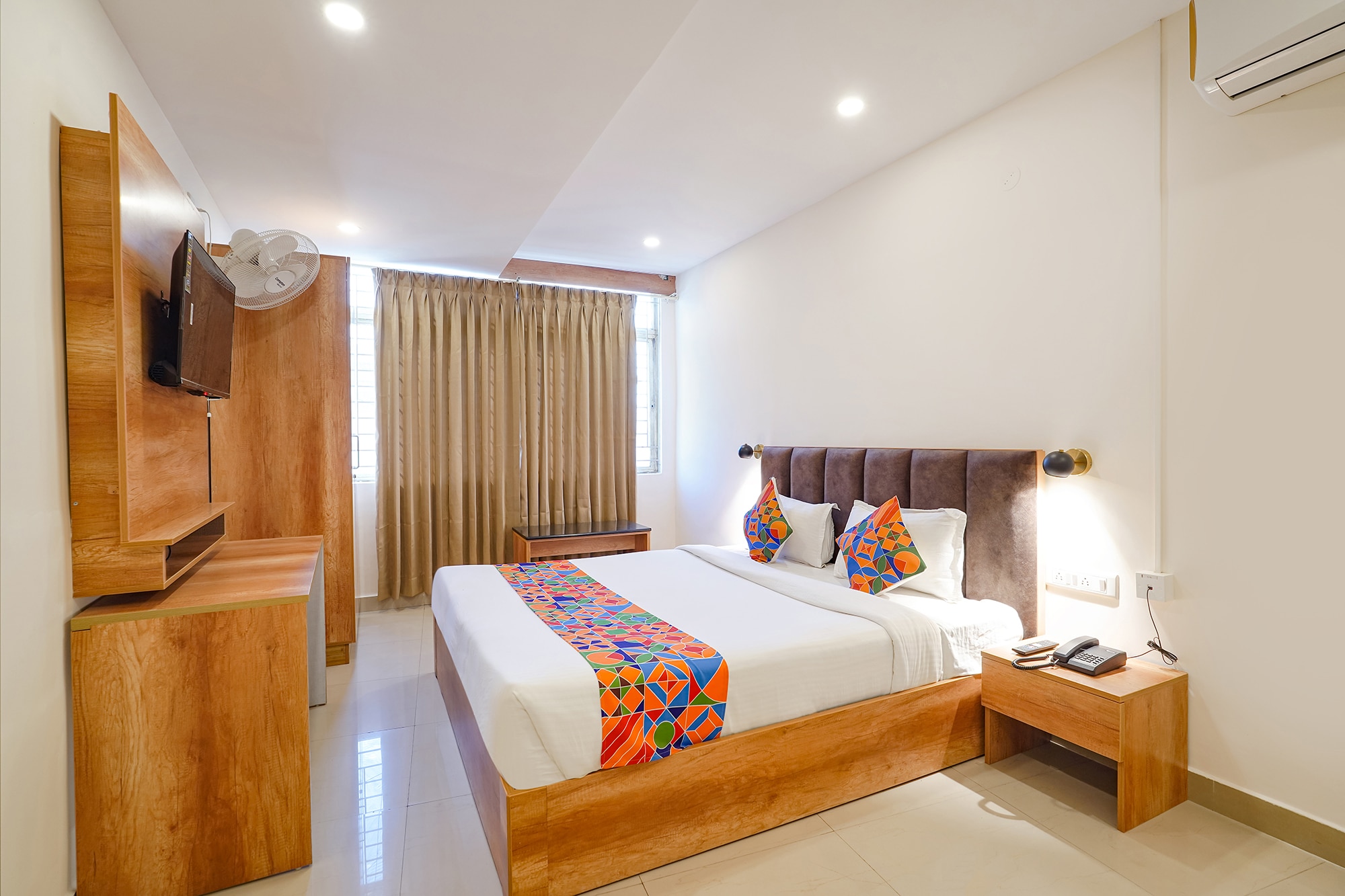 FabHotel Indian Suites - Old Madras Rd - Tap to explore photos
