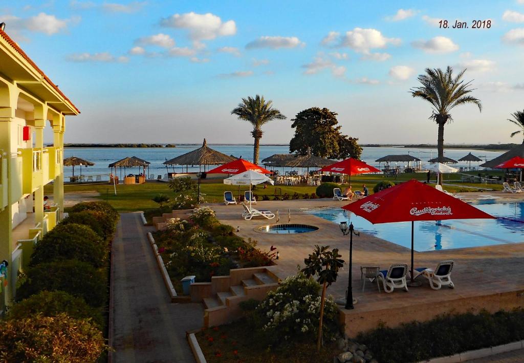 Flamingo Beach Hotel - Tap to explore photos