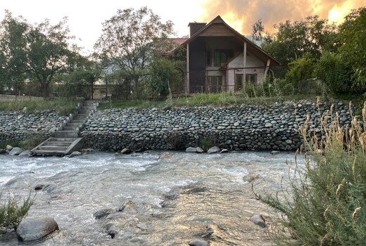 Birdsong 6BR Stay with Riverside by Homeyhuts
