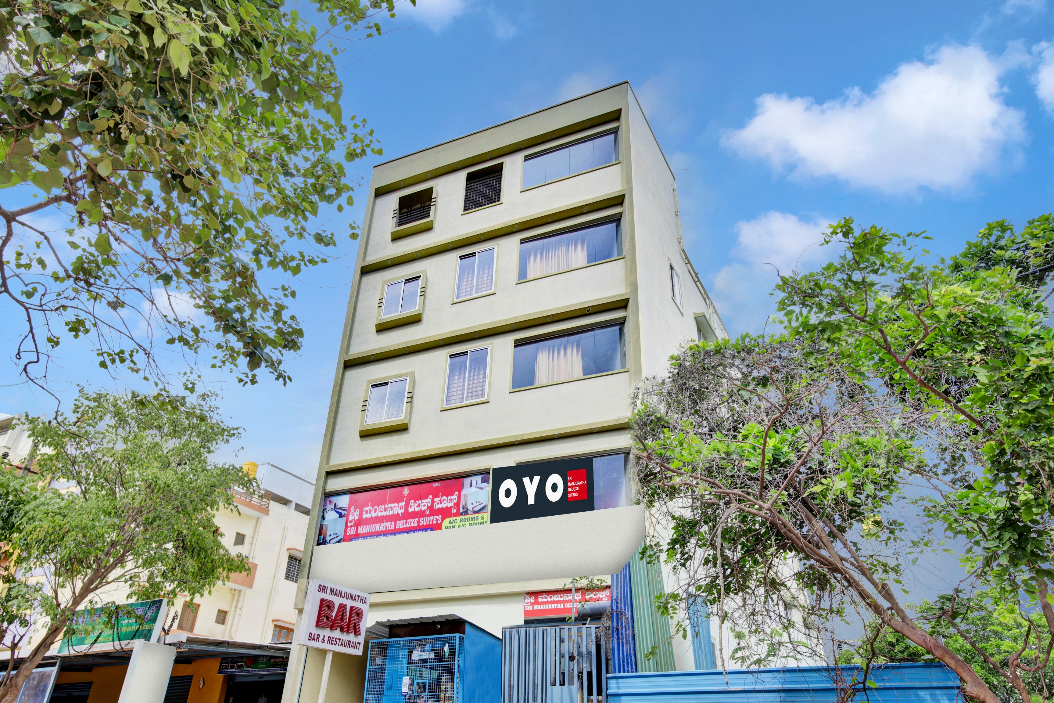 Hotel O Sri Manjunatha Deluxe Suites Yelahanka Junction - Tap to explore photos