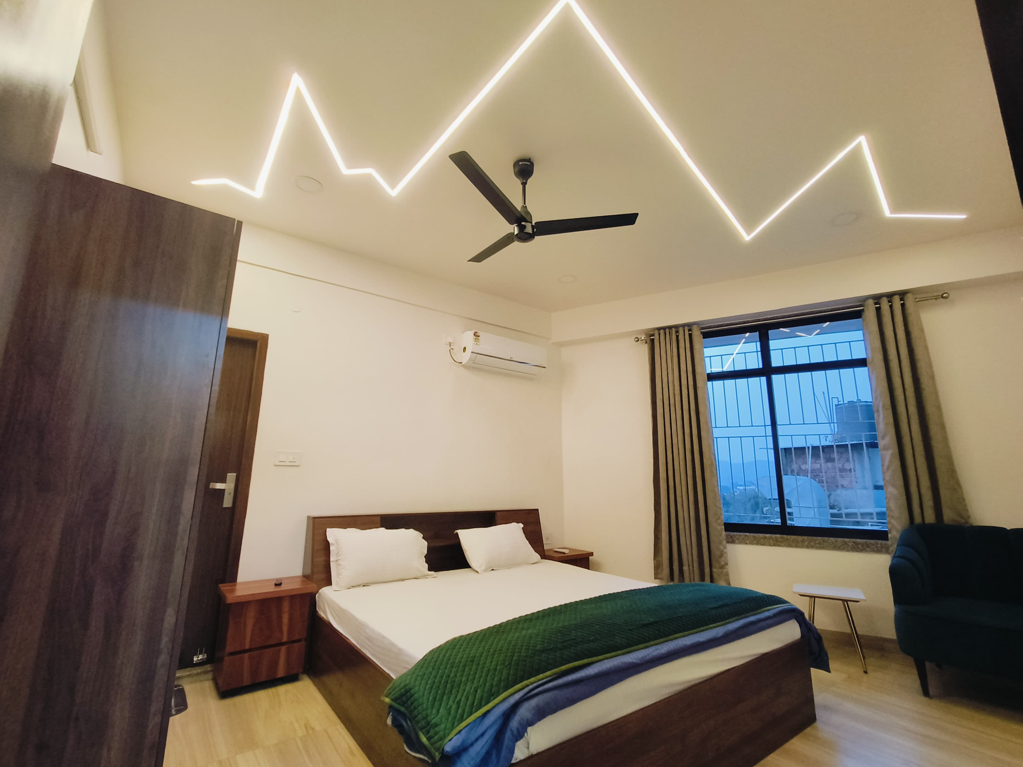 Leafyinn Elite Abode 3BHK - Tap to explore photos