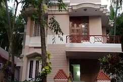 Thushara Room in a Homestay, Kovalam and Poovar