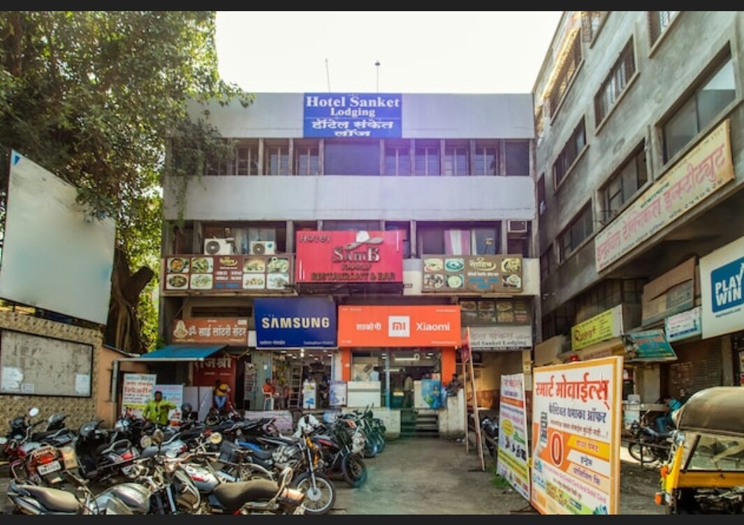 Hotel Sanket - Tap to explore photos