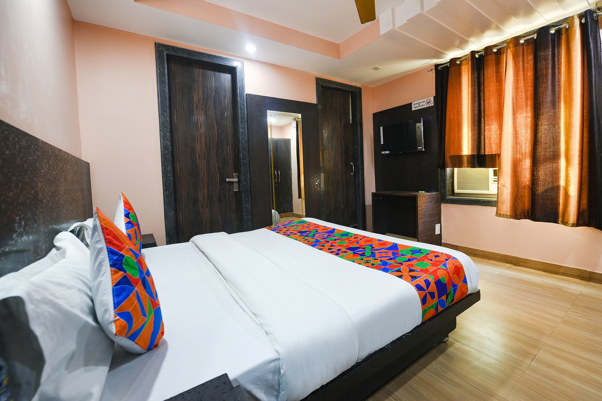 FabHotel Moon Light - Nr. Yashobhoomi Convention Centre - Tap to explore photos