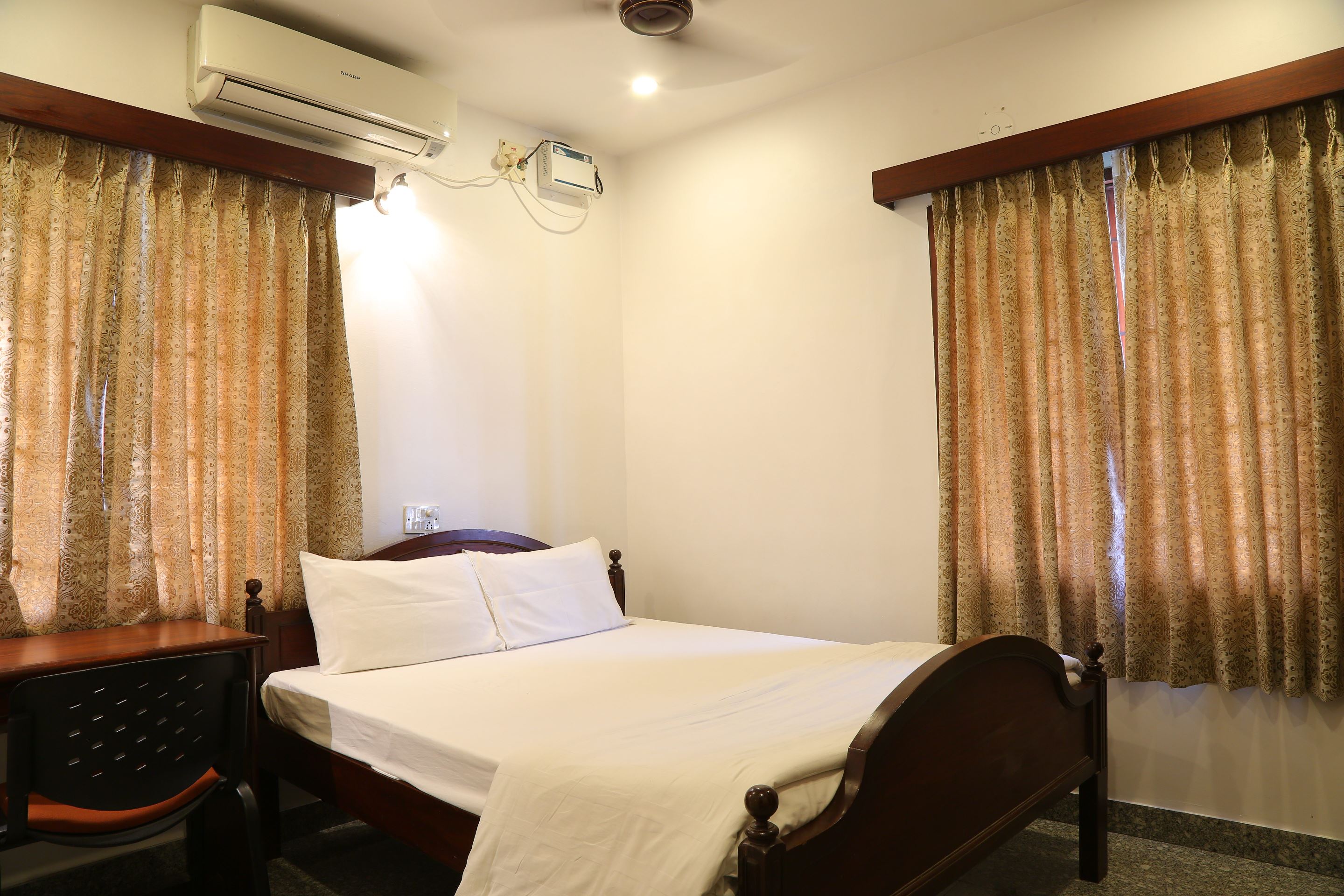 Executive Inn - A boutique Hotel - Tap to explore photos