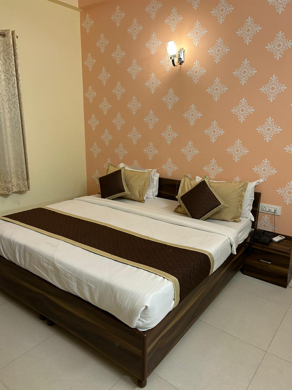 Hotel Mahima Palace - Tap to explore photos