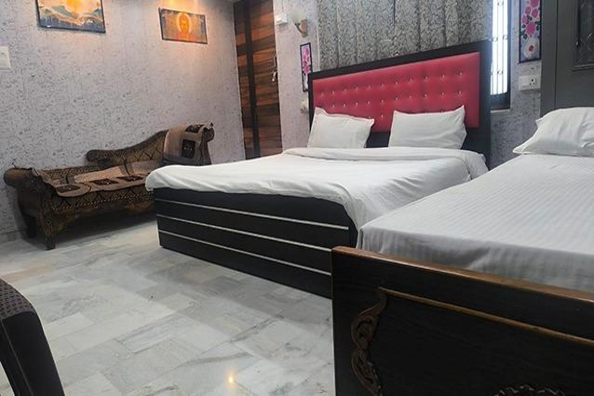 FabHotel Baba Guest House - Tap to explore photos