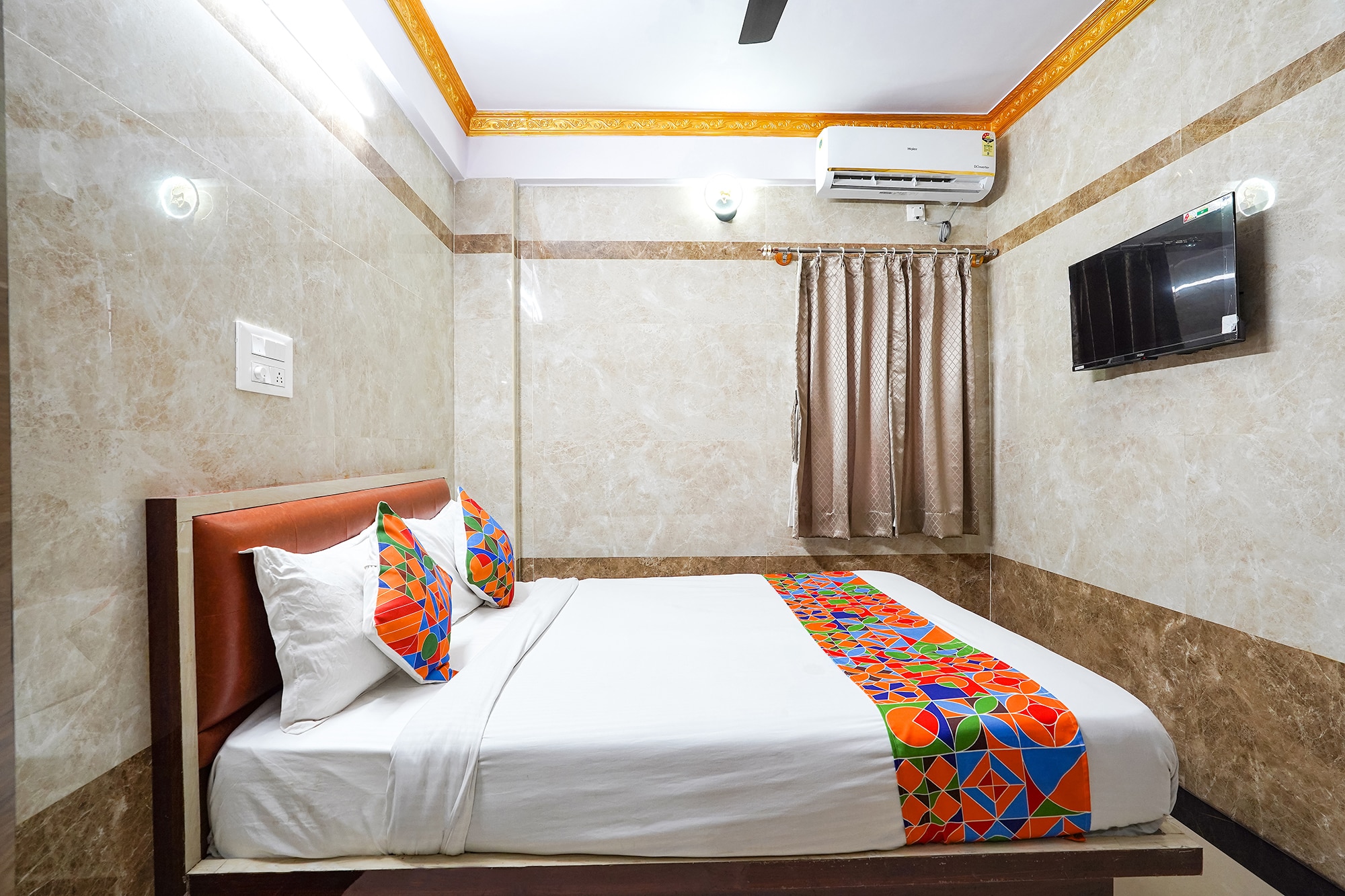 FabHotel SN Residency - Chord Road - Tap to explore photos
