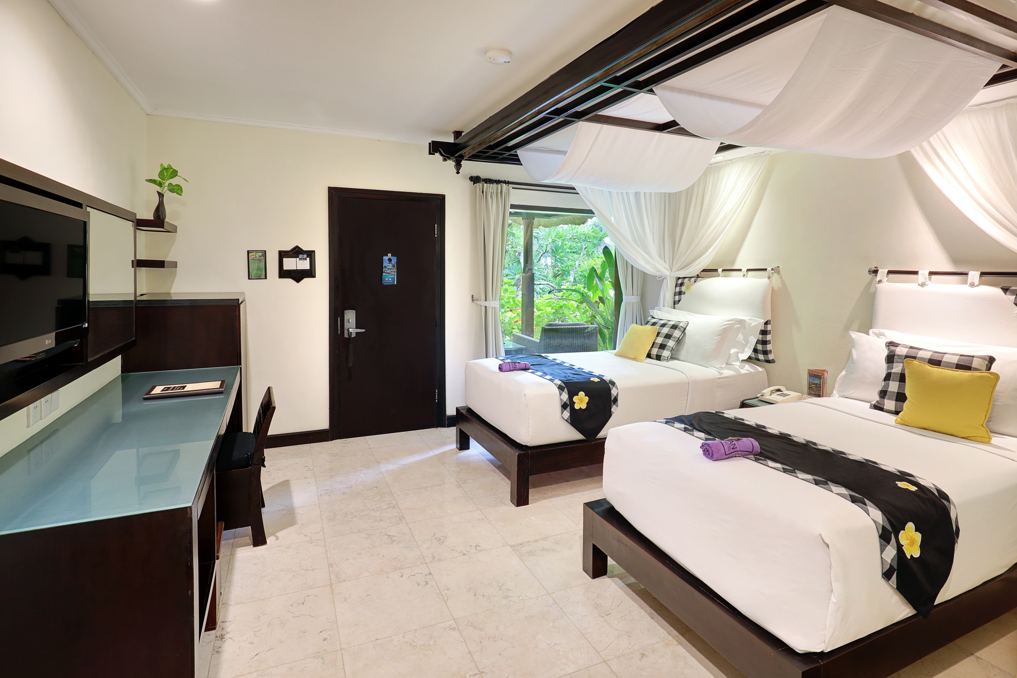 Legian Beach Hotel - Tap to explore photos