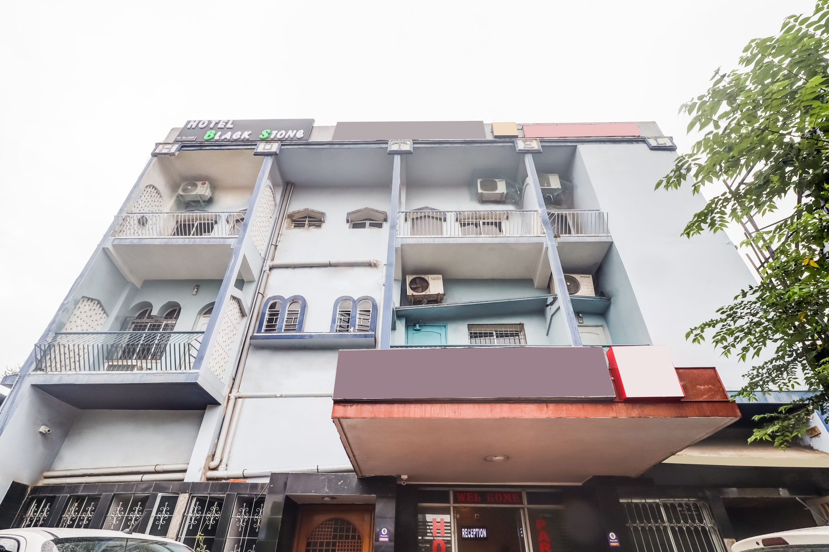 Super OYO Hotel O Black Stone - Tap to explore photos