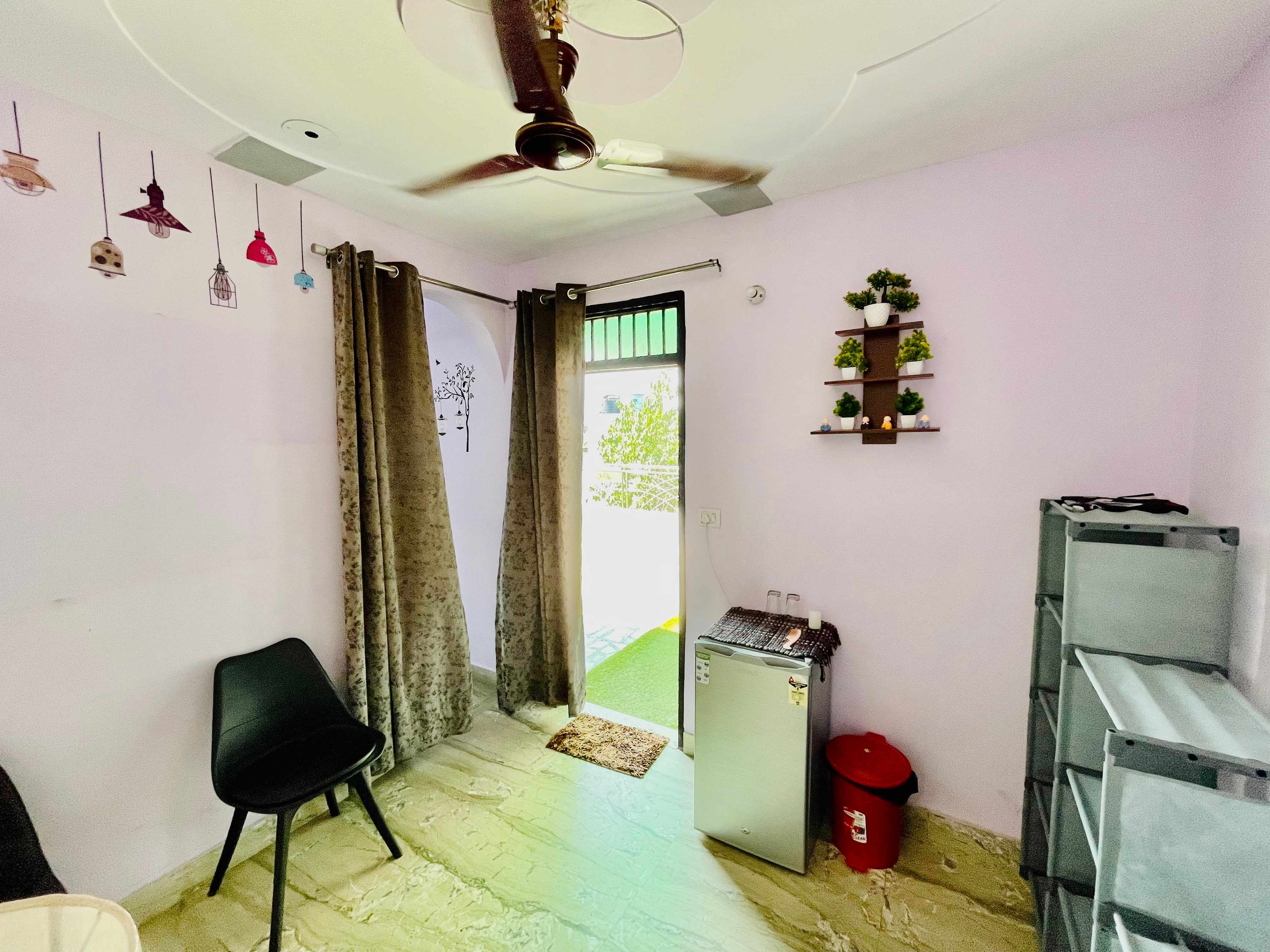 The House 1-Bedroom Flat in Rohini Sector 5 - Tap to explore photos