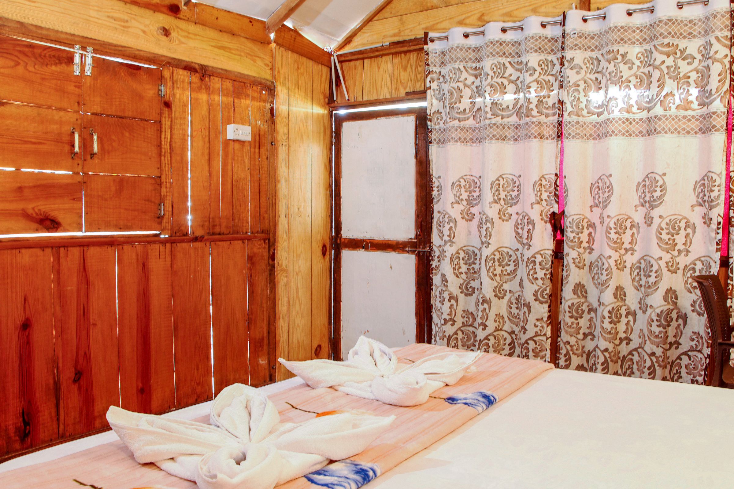 Sameer Cottages | Wooden Beach Huts - Tap to explore photos