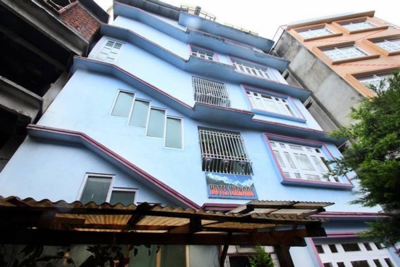 Hotel Wangdi - Tap to explore photos