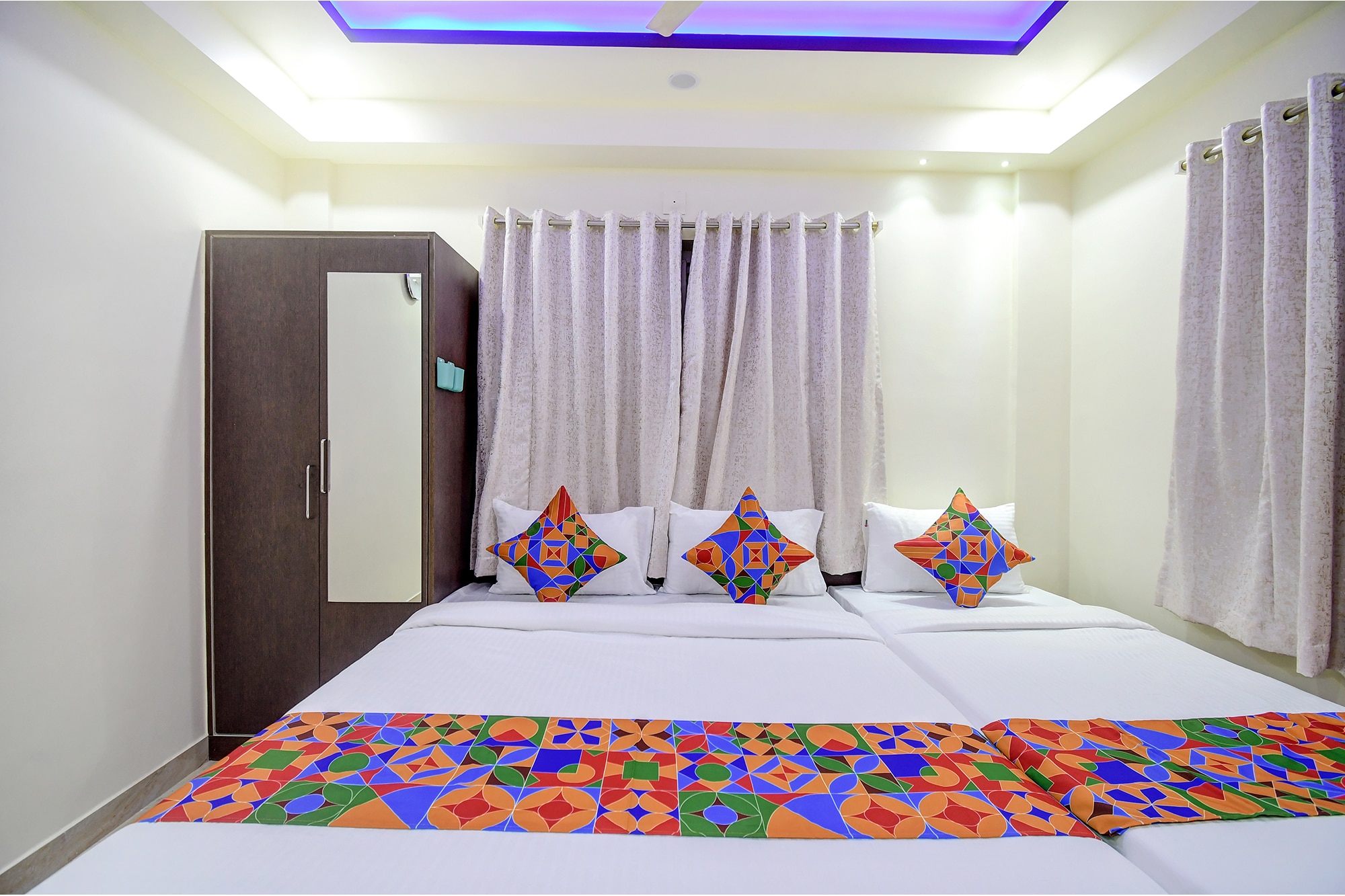 FabHotel Anchorage Inn - Nr. Axis Mall - Tap to explore photos