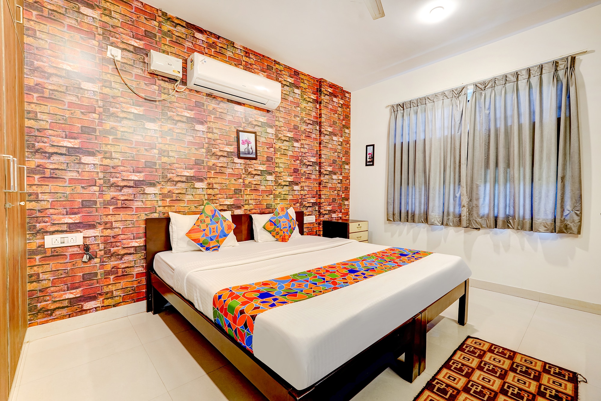 FabExpress Kings Suites HRBR Layout - Nr. Manyata Tech Park - Tap to explore photos