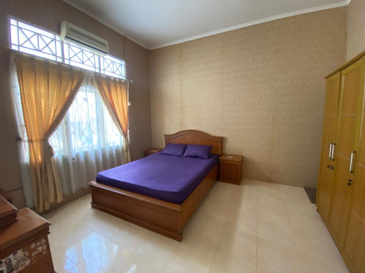 OYO 93292 Raudhatul Husna Homestay Syariah - Tap to explore photos