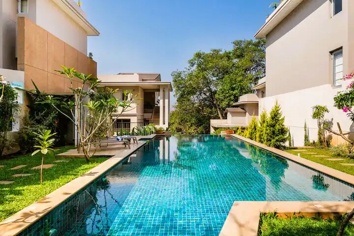 Da Alohas Hibiscus Oasis | Pool Facing | Candolim - Tap to explore photos